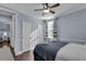 Serene bedroom showcasing natural light, ceiling fan, and inviting atmosphere at 1730 Connecticut Ave, St Cloud, FL 34769