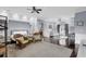 Open bedroom area with sitting area, hardwood floors, and views to the sitting room at 1730 Connecticut Ave, St Cloud, FL 34769