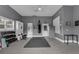 Spacious exercise room featuring a heavy bag, workout equipment, and ample natural light at 1730 Connecticut Ave, St Cloud, FL 34769