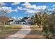 Charming two-story home with a separate garage, well-manicured lawn, and inviting curb appeal at 1730 Connecticut Ave, St Cloud, FL 34769