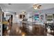 Expansive game room with a bar, ping pong table, and a staircase to another level at 1730 Connecticut Ave, St Cloud, FL 34769