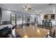 Large game room with a bar, ping pong table, and an area for games and entertainment at 1730 Connecticut Ave, St Cloud, FL 34769