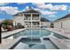 Gorgeous backyard pool area with outdoor seating, perfect for relaxation and entertaining at 1730 Connecticut Ave, St Cloud, FL 34769