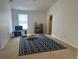 Inviting bedroom with window, plush carpet and ample space at 290 Clydesdale Cir, Sanford, FL 32773
