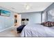 Bedroom with gray walls, a queen bed, and a desk area at 290 Clydesdale Cir, Sanford, FL 32773