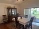 Comfortable dining area with sliding glass doors and a large dining room table at 290 Clydesdale Cir, Sanford, FL 32773