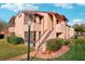 Inviting condo featuring private entrances and lush landscaping, offering a blend of comfort and curb appeal at 2935 Antique Oaks Cir # 64, Winter Park, FL 32792