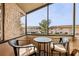 Relaxing screened patio with seating area and view of the community at 2935 Antique Oaks Cir # 64, Winter Park, FL 32792