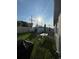 Backyard with lush lawn, shed, patio table and chairs, offering a relaxing outdoor space at 3072 Cassidy Ln, Haines City, FL 33844