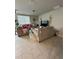 Comfortable living room with tile flooring, neutral paint, and ample seating for Gathering and friends at 3072 Cassidy Ln, Haines City, FL 33844