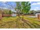 Large backyard with shed and mature trees at 4722 Halliday Ln, Orlando, FL 32810