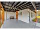 Covered front porch with wood posts and a bench at 4722 Halliday Ln, Orlando, FL 32810