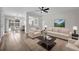 Bright living room with hardwood floors, and neutral furniture at 4722 Halliday Ln, Orlando, FL 32810