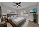 Main bedroom with hardwood floors and large windows at 4722 Halliday Ln, Orlando, FL 32810