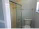 Bathroom with a shower and updated vanity at 4818 Kingston Cir, Kissimmee, FL 34746