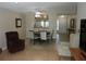 Dining room with a table and chairs, view of kitchen at 4818 Kingston Cir, Kissimmee, FL 34746