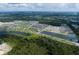 Community overview showing townhomes, lakes, and common areas at 5108 Rain Shadow Dr, St Cloud, FL 34772