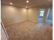 Spacious bedroom with neutral carpeting, recessed lighting, and an en-suite bathroom at 5108 Rain Shadow Dr, St Cloud, FL 34772