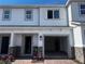 Charming townhome with brick paver walkway, one-car garage and stone accents at 5110 Rain Shadow Dr, St Cloud, FL 34772