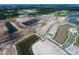 Aerial view of a large undeveloped area with ponds and roads at 5306 Center Lake Ranch Blvd, St Cloud, FL 34771