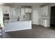 Spacious kitchen featuring white cabinetry, quartz countertops, and herringbone backsplash at 5306 Center Lake Ranch Blvd, St Cloud, FL 34771