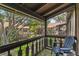 Balcony with outdoor seating and view of grassy area and other buildings at 5413 Hansel Ave # K10, Orlando, FL 32809