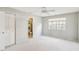 Bedroom featuring neutral walls and carpet, window, ceiling fan, and closet at 5413 Hansel Ave # K10, Orlando, FL 32809