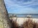 Sandy lakeshore with boats and clear blue water at 5413 Hansel Ave # K10, Orlando, FL 32809