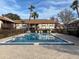 Sparkling community pool with ample lounge space at 5413 Hansel Ave # K10, Orlando, FL 32809