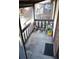 Small screened porch with potted plants at 5413 Hansel Ave # K10, Orlando, FL 32809