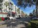 Modern residential street with retail and parking at 5413 Hansel Ave # K10, Orlando, FL 32809