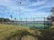 Community tennis courts overlooking the lake at 5413 Hansel Ave # K10, Orlando, FL 32809