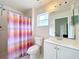 Clean bathroom with shower, toilet and vanity at 5633 Piney Ridge Dr, Orlando, FL 32808