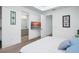 Bedroom with an ensuite bathroom and TV at 7017 Via Carmel Way, Orlando, FL 32819