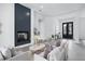 Bright living room featuring modern fireplace, neutral colors, and elegant decor for relaxation at 7017 Via Carmel Way, Orlando, FL 32819
