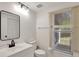 Clean bathroom with white vanity, window with blinds, and modern fixtures at 1135 Madeira Key Way Way, Orlando, FL 32824