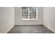 Simple bedroom with gray flooring and a window with blinds at 1135 Madeira Key Way Way, Orlando, FL 32824