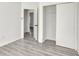 Bedroom with gray flooring, a closet, and an open door at 1135 Madeira Key Way Way, Orlando, FL 32824
