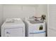 Laundry closet with side-by-side washer and dryer at 1135 Madeira Key Way Way, Orlando, FL 32824