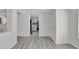 Open concept living area with kitchen view and access to screened patio at 1135 Madeira Key Way Way, Orlando, FL 32824