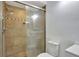 Clean shower with tile surround and glass door at 1135 Madeira Key Way Way, Orlando, FL 32824