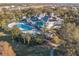 Community pool and clubhouse with solar panels on the roof at 114 Watling Way # 114, Davenport, FL 33897