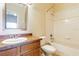 Clean bathroom with tub, toilet, and vanity at 114 Watling Way # 114, Davenport, FL 33897