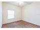 Simple bedroom with carpeted floor and window at 114 Watling Way # 114, Davenport, FL 33897