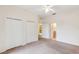 Bedroom with double closets and bathroom access at 114 Watling Way # 114, Davenport, FL 33897