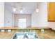Kitchen with double sink and view of living room at 114 Watling Way # 114, Davenport, FL 33897