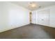 Bedroom featuring neutral walls, plush carpeting, and closet providing ample storage space at 125 Stone Hill Dr, Maitland, FL 32751