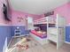 Fun ' bedroom with bunkbeds, princess decor, and colorful bedding at 136 Pompano Beach Dr, Kissimmee, FL 34746