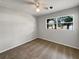 Spacious bedroom with carpet floors and ceiling fan at 1361 Peters Dr, Leesburg, FL 34748