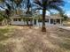 Front view of the house showcasing its curb appeal at 1361 Peters Dr, Leesburg, FL 34748